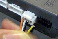 Pulling on the wire part of the connector will cause the wire to break or the coating to peel off.