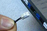 If the wire part is pulled without pressing the lock on the connector, the meter and the connector on the unit side will come off together.
