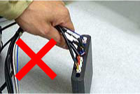 If the wire is left connected and dangling, there is a risk of wire breakage.